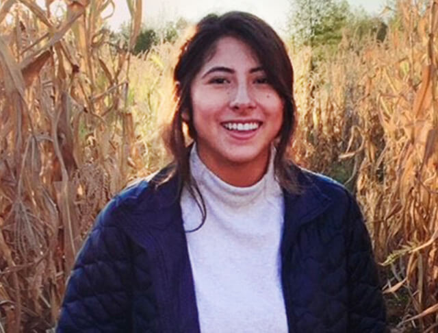 Marcela Angulo in a cornfield