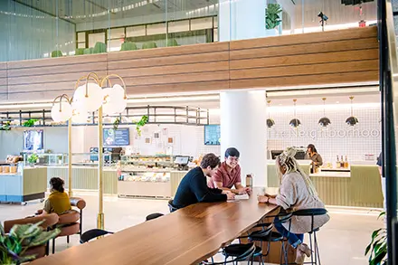 people eating in a cafeteria