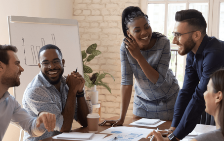 People laughing during a meeting